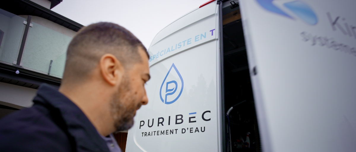 Puribec expert technician performing technical support and preventive maintenance on a water treatment station